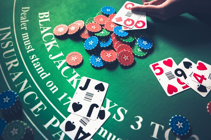 Blackjack Table With Cards and Casino Chips