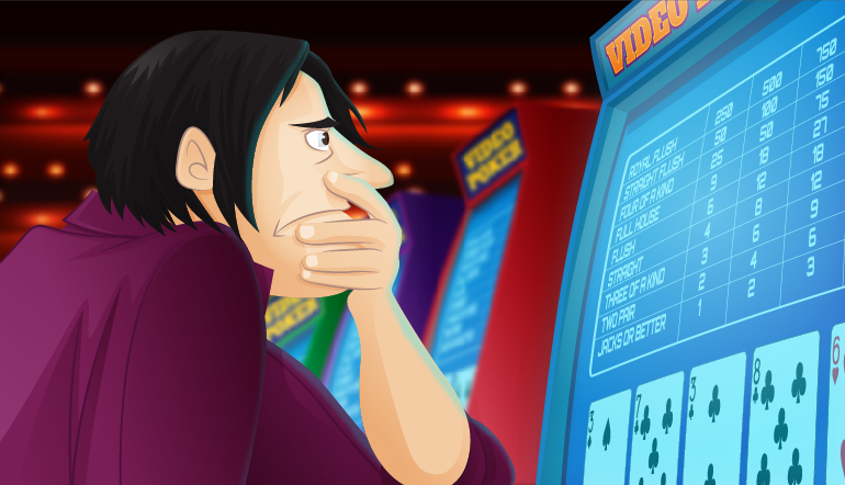 Frowning video poker player with a low pair of cards showing on the machine